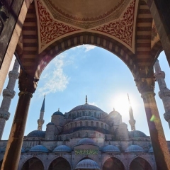 view through the arch and the gate to the blue mosque Istanbul is Turkey